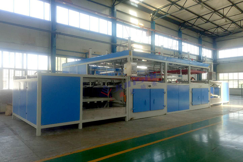 雙頭自動(dòng)<a href=http://www.penglecw.com/ target=_blank class=infotextkey>吸塑機(jī)</a>.jpg